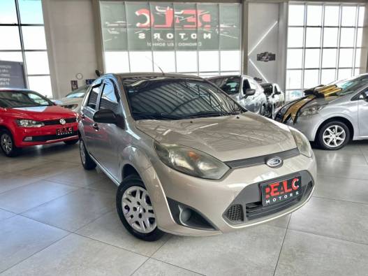 FORD - FIESTA - 2010/2011 - Dourada - R$ 28.900,00