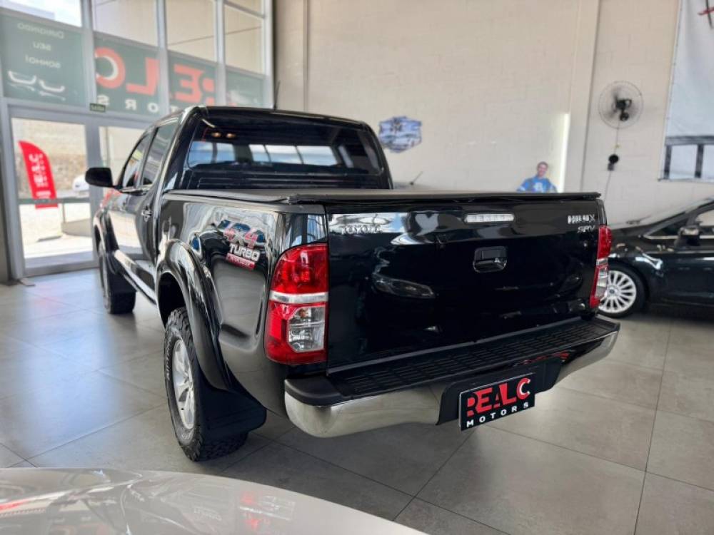TOYOTA - HILUX - 2014/2014 - Preta - R$ 144.900,00